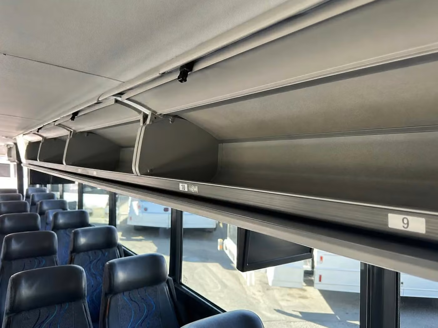 banning 18 passenger minibus overhead storage