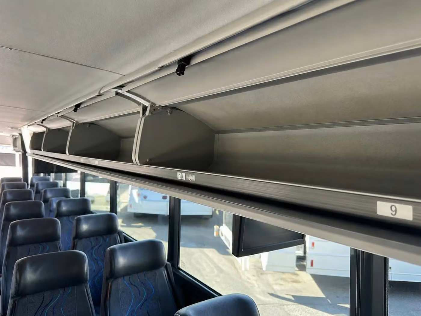 banning charter bus overhead storage
